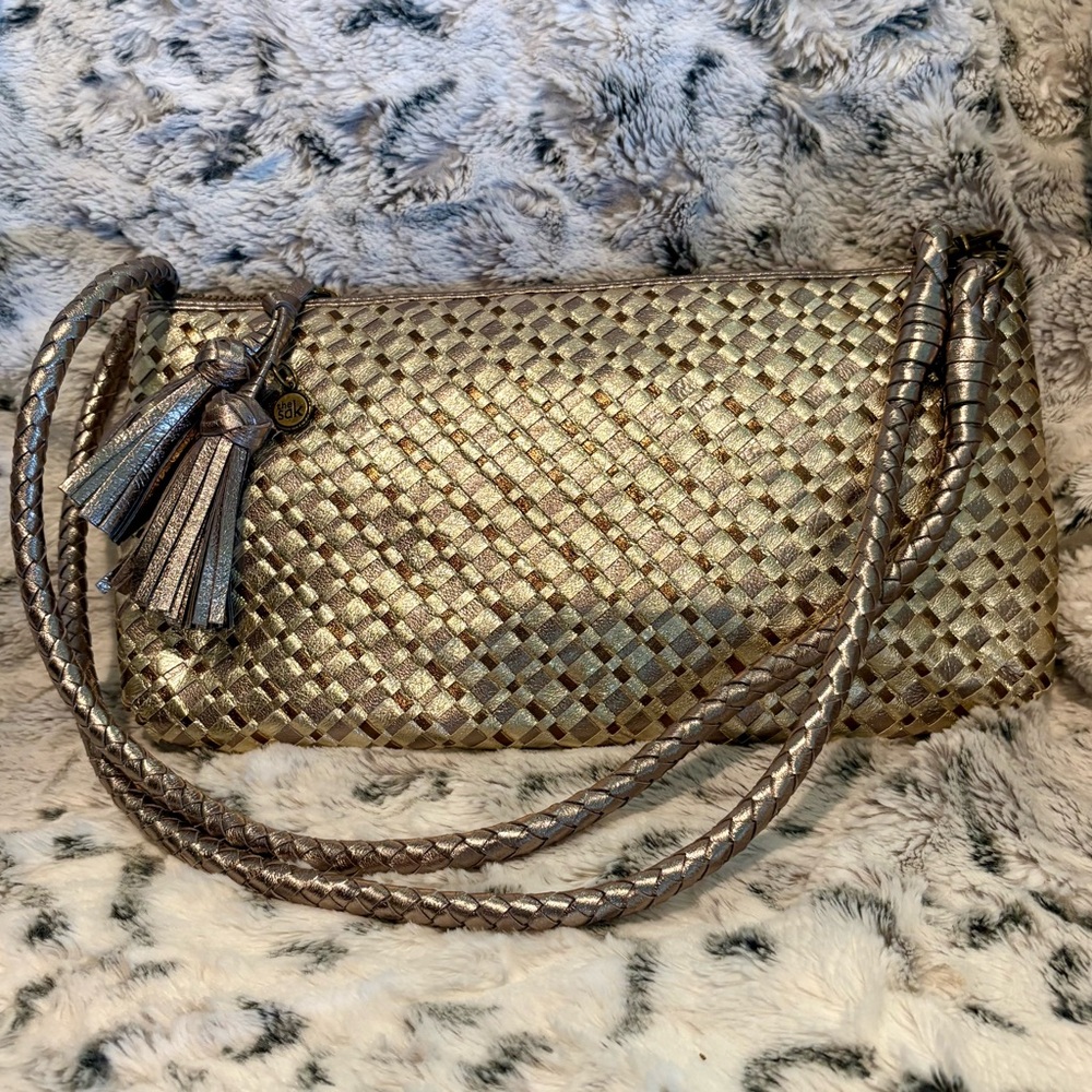 The Sak Woven Metallic Gold Crossbody with Tassel